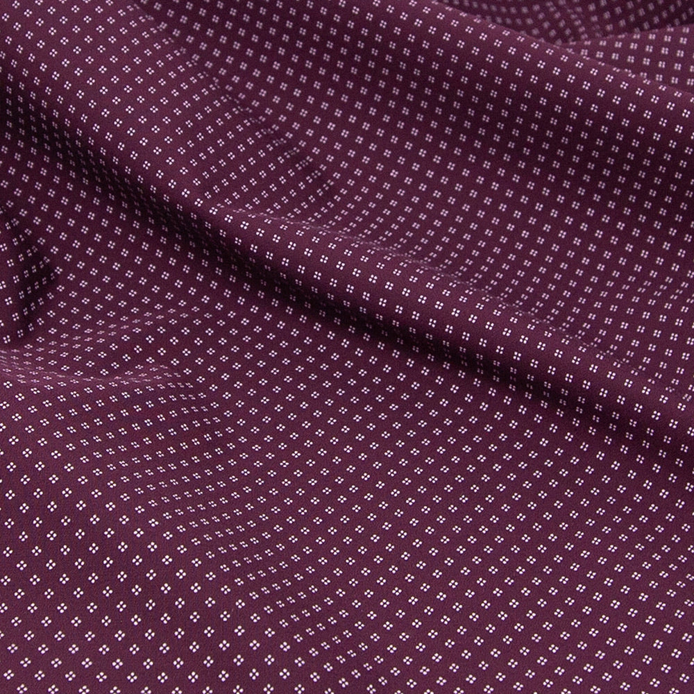 maroon button up collared shirt short sleeve fabric closeup