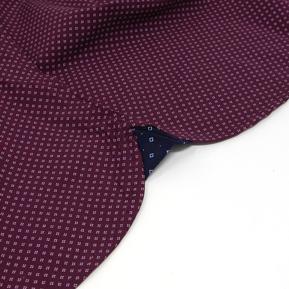 maroon button up collared shirt short sleeve  gusset closeup