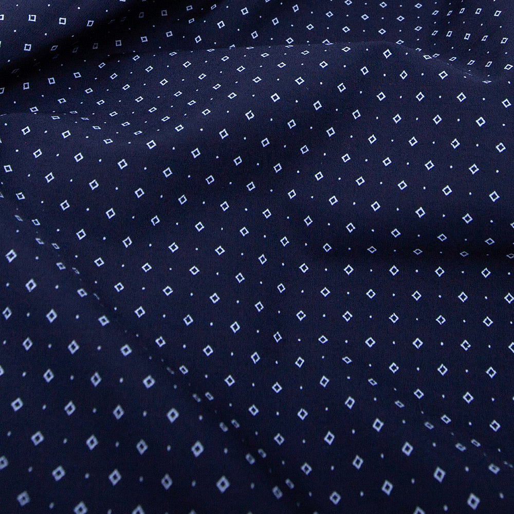 navy blue collared button up shirt short sleeve fabric closeup